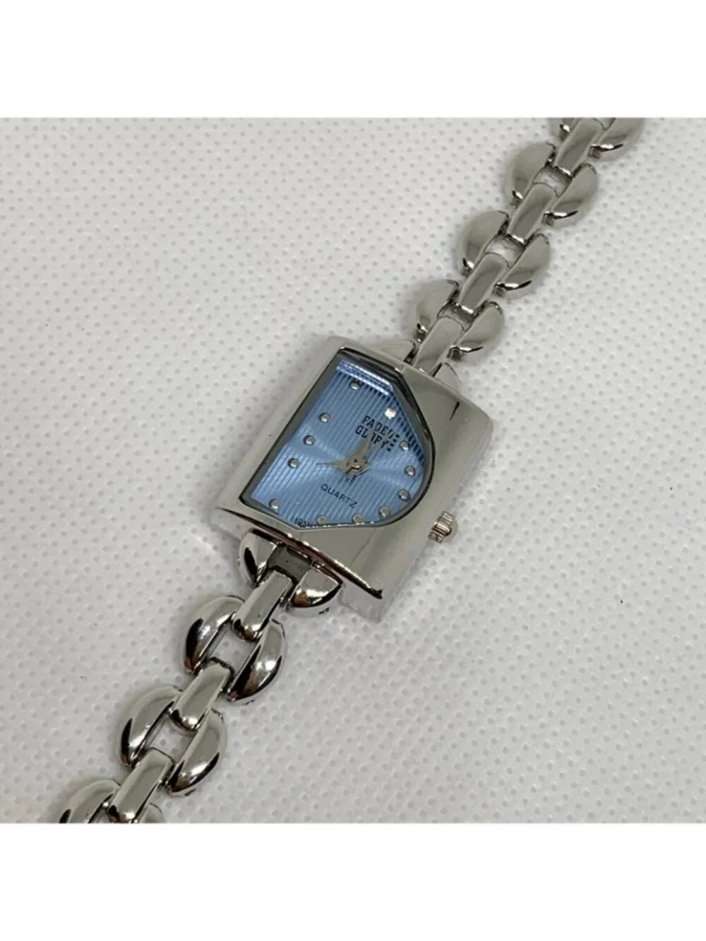 Advance Faded Glory silver tone watch blue dial 19mm quartz up to 7.5” running